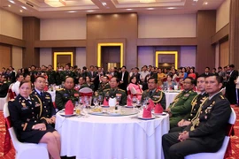 Tuỳ viên Quốc phòng các nước tại Lào dự lễ kỷ niệm. (Nguồn: Phạm Kiên/TTXVN)