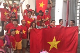 Các cổ động viên Việt Nam. (Nguồn: Đỗ Quyên/TTXViệt Nam)