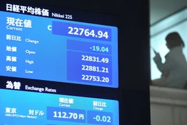 Bảng tỉ giá chứng khoán tại Tokyo, Nhật Bản. (Nguồn: AFP/TTXVN)