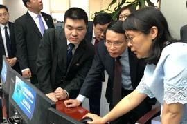 Tổng Giám đốc Thông tấn xã Việt Nam Nguyễn Đức Lợi thăm và làm việc tại Trung Quốc. (Nguồn: TTXVN)