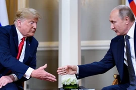 Lãnh đạo hai nước Mỹ và Nga gửi thông điệp hợp tác. (Nguồn: AFP)