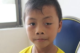 Cháu Phạm Hữu Duy, nạn nhân vụ bắt cóc. (Ảnh: Hoàng Ngọc/Vietnam+)