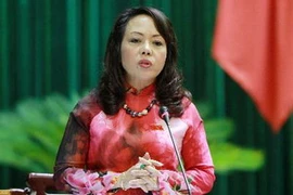 Bộ trưởng Y tế Nguyễn Thị Kim Tiến trả lời chất vấn Quốc hội. (Ảnh: Nhan Sáng/TTXVN)
