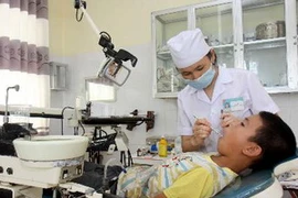 Khám chữa bệnh tại Bệnh viện Đa khoa Ba Vì, Hà Nội. (Ảnh: Thanh Tùng/TTXVN)