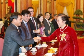 Phó Chủ tịch nước Nguyễn Thị Doan gặp mặt thân mật các Nhà tài trợ cho Quỹ Bảo trợ trẻ em Việt Nam. (Ảnh: Dương Giang/TTXVN)