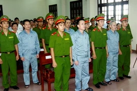 Các bị cáo tại phiên tòa. (Ảnh: Doãn Tấn/TTXVN)
