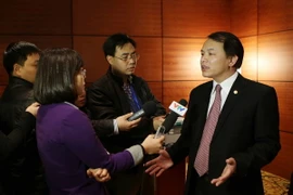 Phó Chánh văn phòng Trung ương Đảng Lê Quang Vĩnh trả lời phỏng vấn báo chí chiều 24/1. (Nguồn: TTXVN)