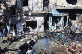 Hiện trường một vụ đánh bom xe ở Homs, Syria. (Nguồn: AFP/TTXVN)