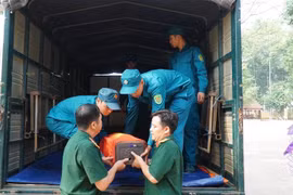 Ban Chỉ đạo 24 thị xã Bình Long tổ chức lễ bàn giao 25 hài cốt liệt sỹ vừa được phát hiện và cất bốc tại địa phương cho Bộ Chỉ huy Quân sự tỉnh Bình Phước. (Ảnh: TTXVN phát)