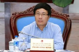 Phó Thủ tướng, Bộ trưởng Ngoại giao Phạm Bình Minh, Chủ tịch Ủy ban Quốc gia APEC 2017 chủ trì phiên họp lần thứ hai của Ủy ban Quốc gia APEC 2017. (Ảnh: Thống Nhất/TTXVN)