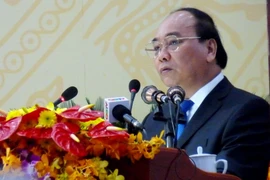 Ông Nguyễn Xuân Phúc, Ủy viên Bộ chính trị, Phó Thủ tướng Chính phủ phát biểu tại Đại hội. (Ảnh: Hi Trang-Đức Thọ/Vietnam+)