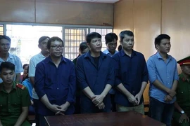 Các bị cáo nghe tuyên án. (Ảnh: Thành Chung/TTXVN)