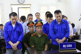 Các bị cáo tại phiên tòa. (Ảnh: Kim Anh/TTXVN)