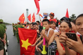 Ai ai cũng hào hứng và tự hào với chiến tích lịch sử lọt vào top 4 của Olympic Việt Nam. (Ảnh: PV/Vietnam+) 