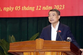 Ông Lê Minh Hưng, Bí thư Trung ương Đảng, Chánh Văn phòng Trung ương Đảng, phát biểu tại cuộc tiếp xúc cử tri. (Ảnh: Hữu Quyết/TTXVN)