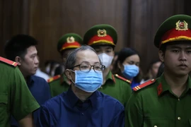 Bị cáo Nguyễn Minh Quân (cựu Giám đốc Bệnh viện thành phố Thủ Đức), bị xét xử về 2 tội "tham ô tài sản" và "rửa tiền." (Ảnh: Thành Chung/TTXVN)