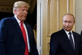 Tổng thống Nga Vladimir Putin (phải) và Tổng thống Mỹ Donald Trump tại cuộc gặp thượng đỉnh ở Helsinki, Phần Lan ngày 16/7. (Ảnh: AFP/TTXVN)