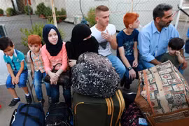 Người tị nạn Syria tại Beirut (Liban) chờ để hồi hương ngày 9/9/2018. (Ảnh: AFP/TTXVN)