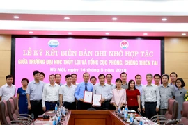 Lễ ký thỏa thuận. (Ảnh: Thu Lương/Vietnam+)