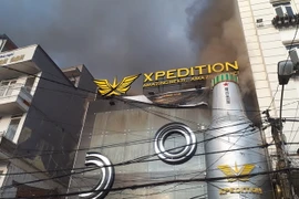 Hiện trường vụi cháy. (Ảnh: Đặng Tuấn/TTXVN)