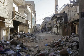 Cảnh đổ nát sau các cuộc xung đột ở Damascus, Syria ngày 3/11. (Ảnh: AFP/TTXVN)