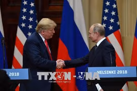 Tổng thống Mỹ Donald Trump (trái) và Tổng thống Nga Vladimir Putin trong cuộc họp báo chung kết thúc Hội nghị thượng đỉnh ở Helsinki, Phần Lan ngày 16/7. (Nguồn: AFP/ TTXVN) 