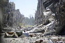 Cảnh đổ nát tại trại tị nạn Yarmuk ở Damascus. (Nguồn: AFP/TTXVN)