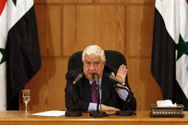 Ngoại trưởng Syria Walid Muallem phát biểu tại một cuộc họp báo ở Damascus. (Ảnh: AFP/TTXVN)