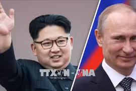 Tổng thống Nga Vladimir Putin (trái) và nhà lãnh đạo Triều Tiên Kim Jong-un. (Ảnh: AFP/TTXVN)