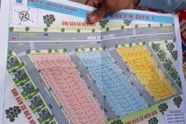 Dự án đất nền Green City trên đường Võ Văn Bích, huyện Củ Chi, TP. Hồ Chí Minh được quảng cáo hấp dẫn trong khi thực tế chỉ là bãi ruộng đang san lấp dang dở. (Ảnh: Trần Xuân Tình/TTXVN)