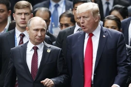 Tổng thống Nga Putin (phải) và Tổng thống Mỹ Donald Trump. (Nguồn: AFP/TTXVN)