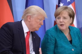 Tổng thống Mỹ Donald Trump (trái) và Thủ tướng Đức Angela Merkel. (Nguồn: AFP/TTXVN) 