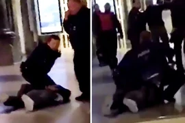 Đối tượng bị cảnh sát khống chế. (Nguồn: express.co.uk)