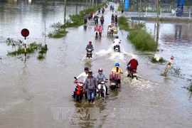 Các huyện Phú Hòa, Đông Hòa, Tuy An, Đồng Xuân… của tỉnh Phú Yên bị ngập trong nước do bão số 12. (Ảnh: Thế Lập/TTXVN)
