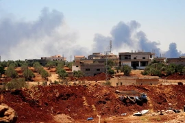 Quân đội Chính phủ Syria phóng tên lửa vào các mục tiêu của lực lượng nổi dậy ở Daraa ngày 5/7. (Ảnh: THX/TTXVN)