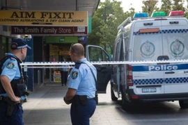 Cảnh sát điều tra tại hiện trường vụ nổ súng. (Nguồn: The Sydney Morning Herald/TTXVN)