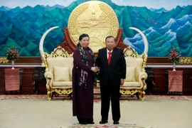 Tổng Bí thư, Chủ tịch nước Lào Bounnhang Volachith tiếp Phó Chủ tịch Quốc hội Tòng Thị Phóng. (Ảnh: Phạm Kiêm/Vietnam+)