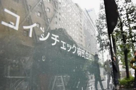  Tên của sàn giao dịch Coincheck được gắn trên tòa nhà thuộc sở hữu của công ty ở Tokyo ngày 2/2. (Nguồn: Kyodo/TTXVN)