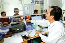 Phòng giao dịch Một cửa tại BHXH thành phố Pleiku (Gia Lai). (Ảnh: Dương Ngọc/TTXVN)