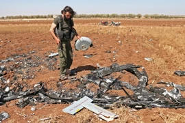  Các mảnh vỡ của chiếc máy bay không người lái của Syria bị Israel bắn hạ tại Barqah (Syria), gần Cao nguyên Golan ngày 12/7. (Nguồn: AFP/TTXVN)