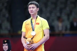 Võ sỹ Nguyễn Minh Phụng giành huy chương bạc Karate hạng cân trên 84kg. (Ảnh: Hoàng Linh/TTXVN)