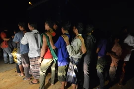 Những người nhập cư bất hợp pháp tại Malaysia. (Nguồn: AFP/TTXVN)