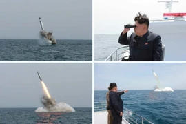 Nhà lãnh đạo Triều Tiên Kim Jong-un quan sát một vụ thử tên lửa đạn đạo từ tàu ngầm ở gần Sinpo, vùng bờ biển phía đông bắc Triều Tiên. (Nguồn: EPA/TTXVN)