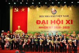 Công bố kết quả bầu Ban Chấp Hành, Ban Kiểm tra và các chức danh Lãnh đạo Hội khóa XI. (Ảnh: Hoài Nam/Vietnam+)