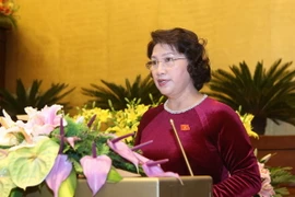 Chủ tịch Quốc hội, Chủ tịch Hội đồng bầu cử quốc gia Nguyễn Thị Kim Ngân trình Quốc hội phê chuẩn việc miễn nhiệm một số Phó Chủ tịch và một số Ủy viên Hội đồng bầu cử quốc gia. (Ảnh: Phương Hoa/TTXVN)