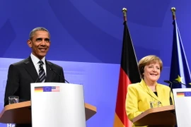 Thủ tướng Đức Angela Merkel (phải) và Tổng thống Mỹ Barack Obama tại buổi họp báo chung sau cuộc hội đàm ở Hannover. (Nguồn: AFP/TTXVN)