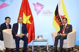Thủ tướng Nguyễn Xuân Phúc gặp Quốc vương Brunei Hassanal Bolkiah, trong chương trình tham dự Hội nghị Cấp cao ASEAN lần thứ 33 và các hội nghị cấp cao liên quan. (Ảnh: Thống Nhất/TTXVN)