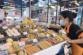 Sản phẩm chế biến có nguồn gốc từ thịt lợn đảm bảo an toàn. (Ảnh: Mỹ Phương/TTXVN)