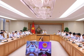 Phó Thủ tướng Trần Hồng Hà chủ trì cuộc họp. (Ảnh: Văn Điệp/TTXVN)