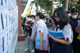 Thí sinh dự thi tại điểm thi Trường Đại học Công nghệ Thành phố Hồ Chí Minh. (Ảnh: Thu Hoài/TTXVN)